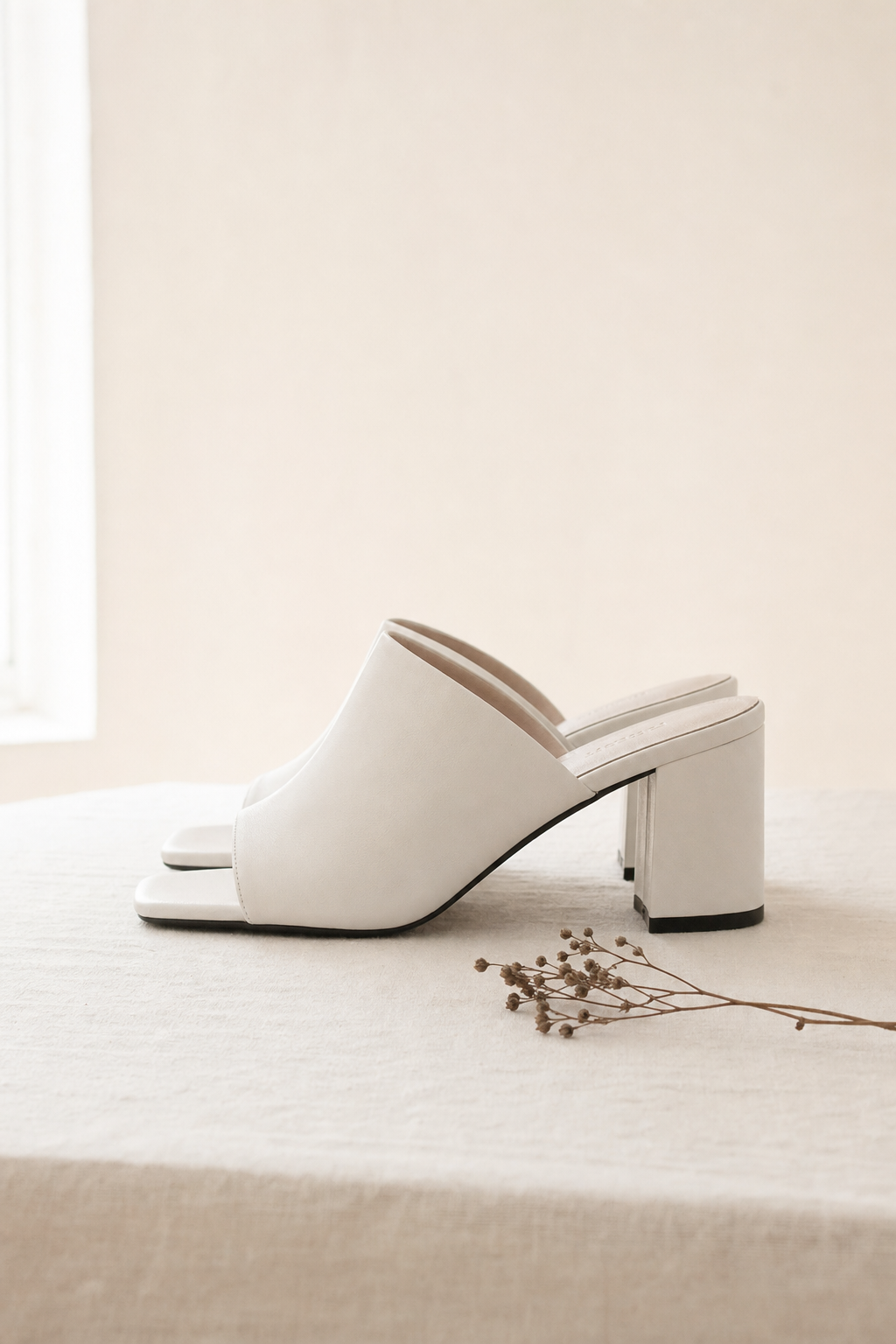 Flattered mule block heel